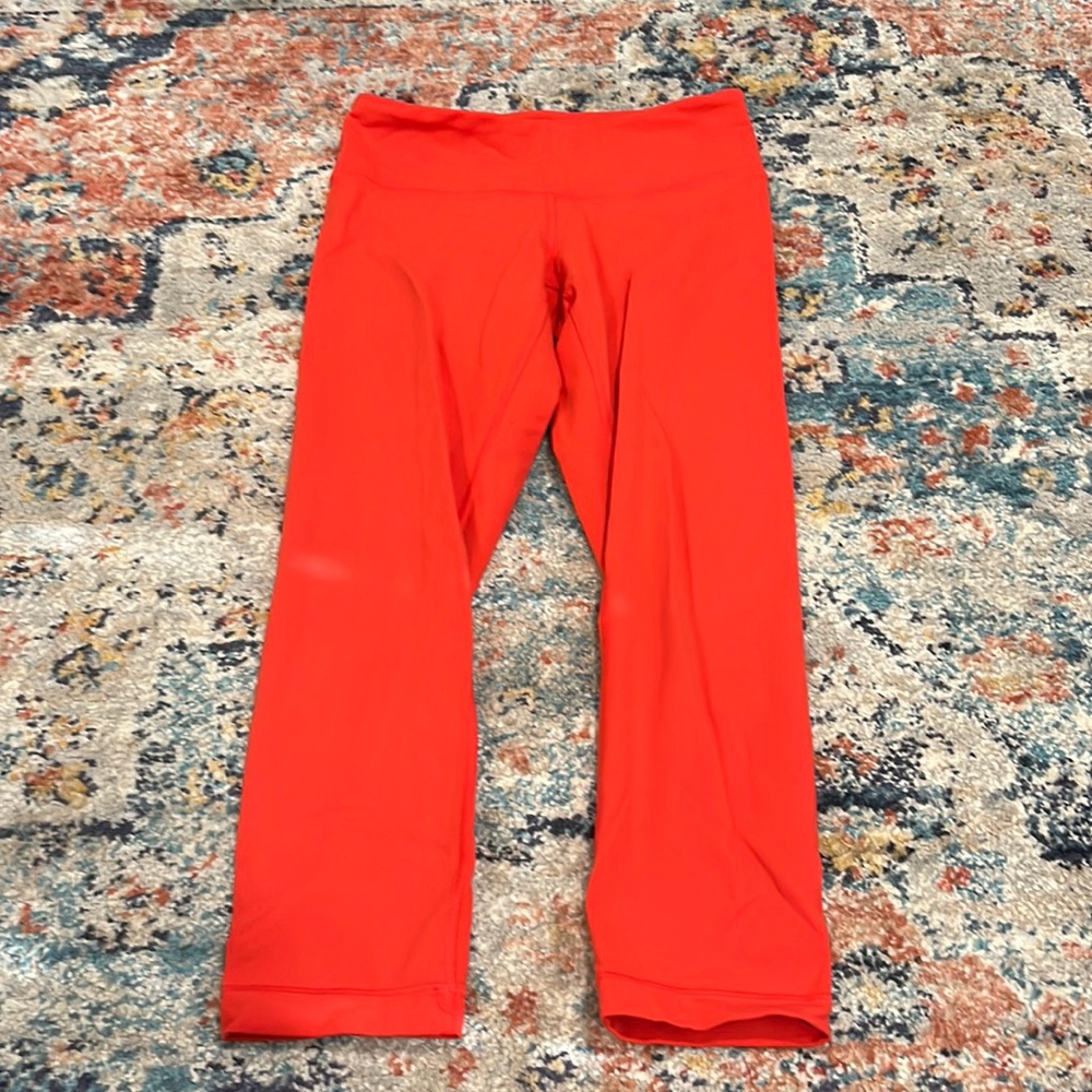 lululemon neon orange capri leggings